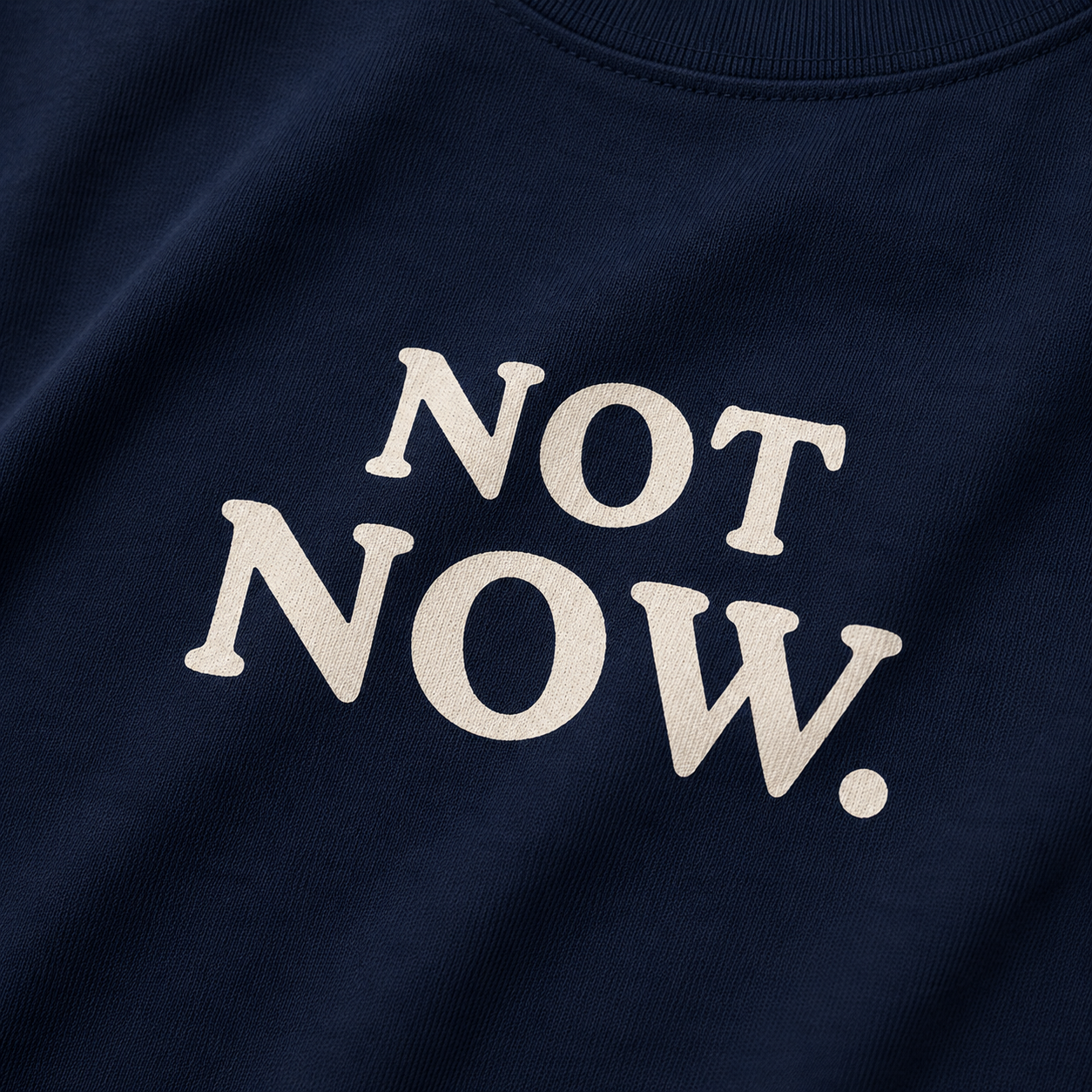 Navy blue t-shirt with 'NOT NOW' text in white