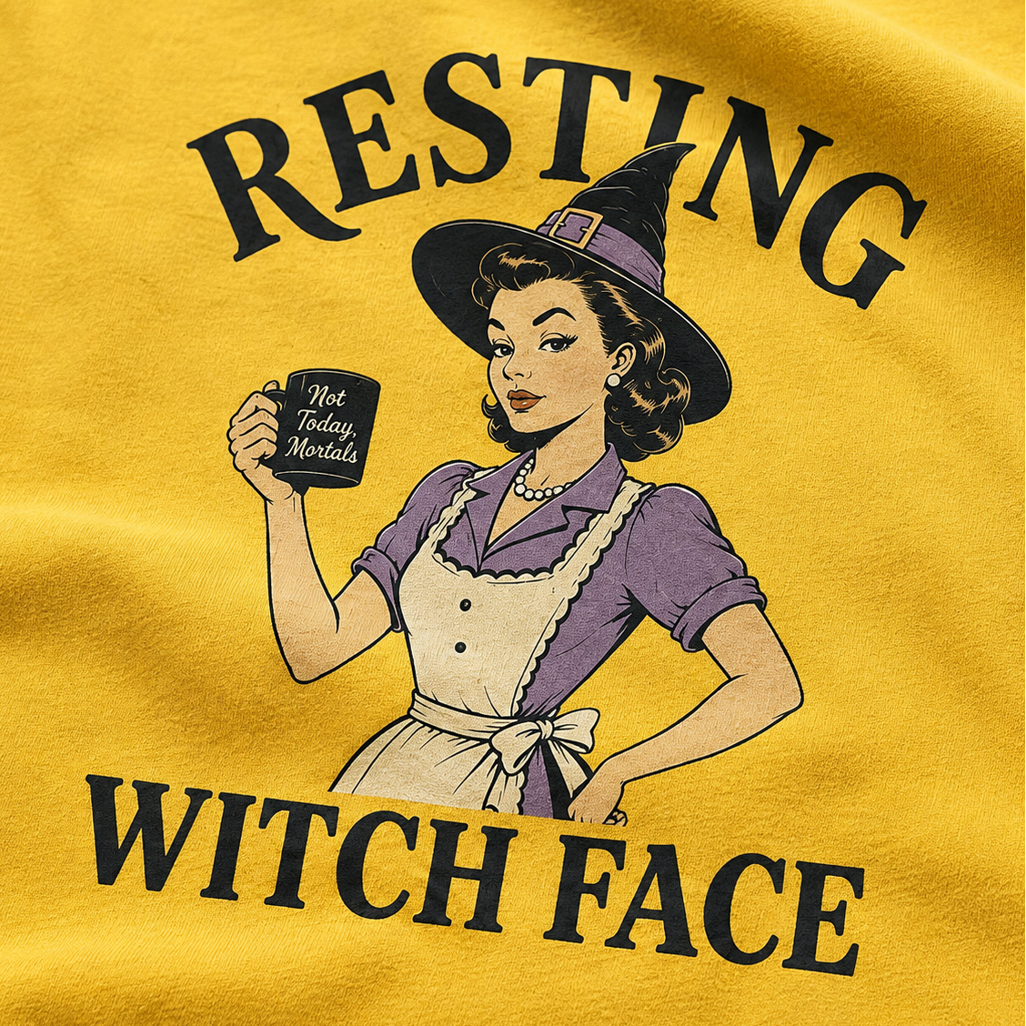 A close-up of a yellow graphic t-shirt featuring a retro-style illustration of a witch holding a mug that reads 'Not Today, Maybe Later.' Large black text above and below reads 'RESTING' and 'WITCH FACE.